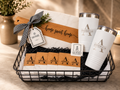 Personalized Home Sweet Home Gift Basket with marble serving board, white tumblers, and engraved coasters