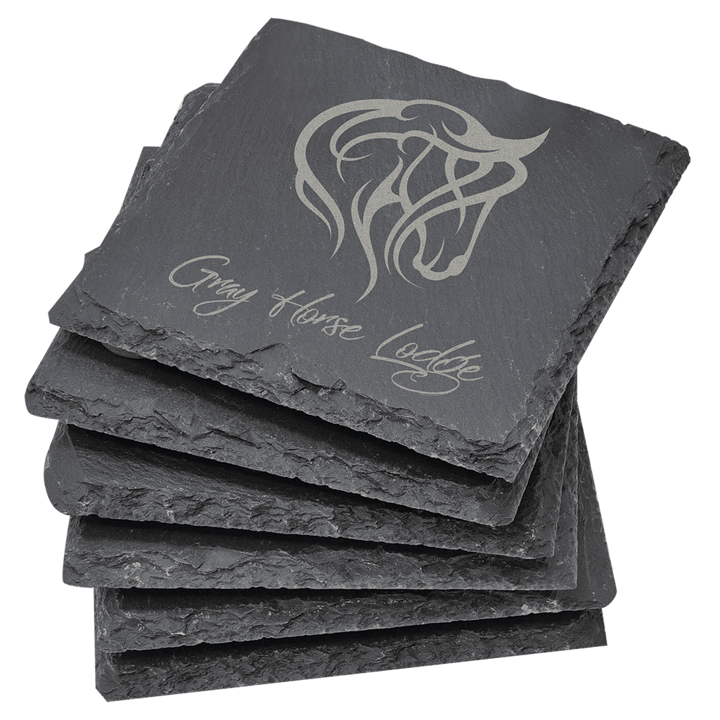 Stack of six laser-engraved square slate coasters with custom Gray Horse Lodge logo