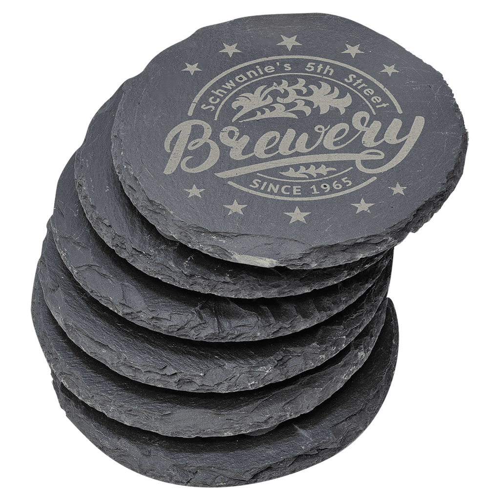 Stack of six laser-engraved slate coasters with custom brewery logo
